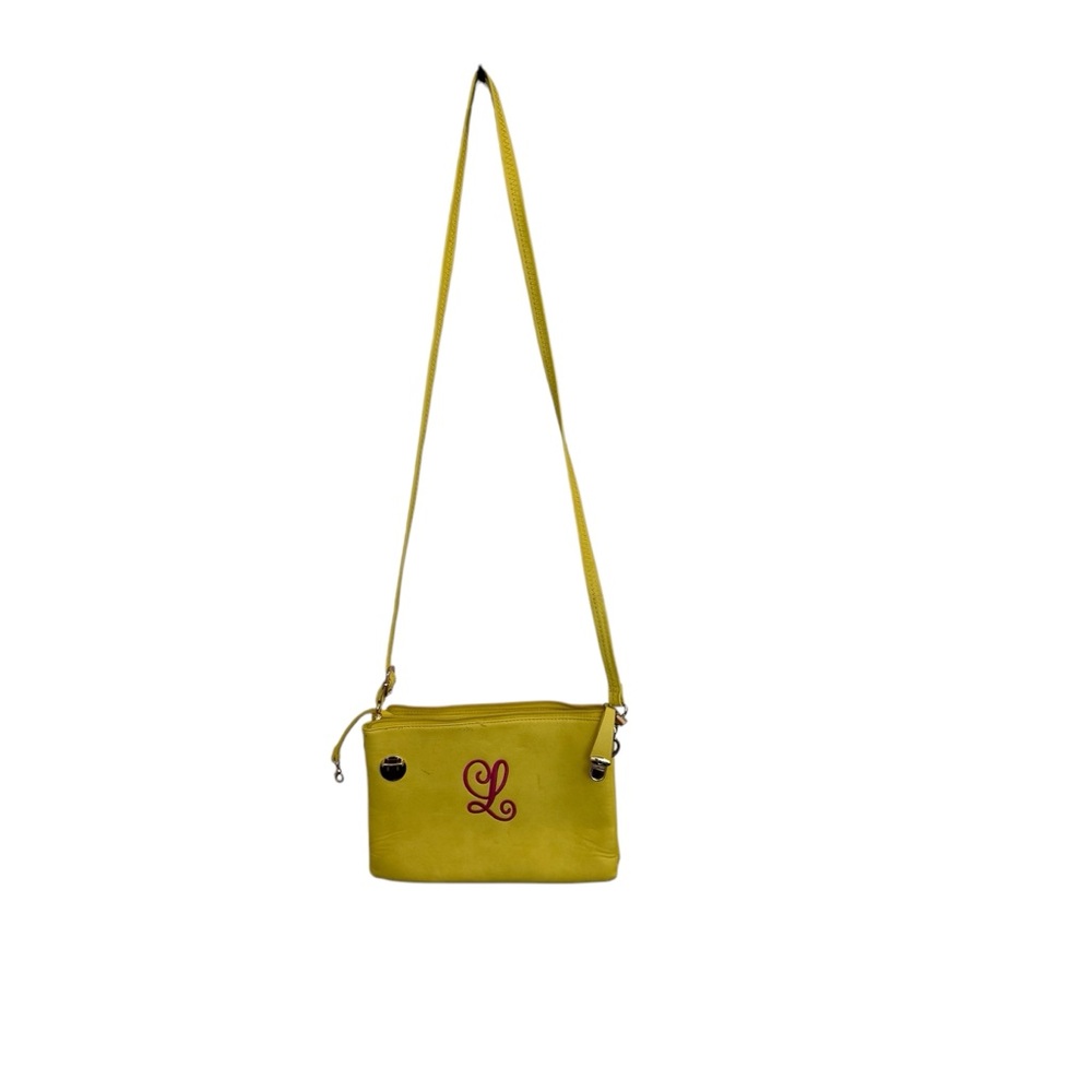 Initials Inc Yellow Crossbody Bag pink L on front. Gold hardware pockets